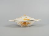 an image of a bowl with a lid on a table