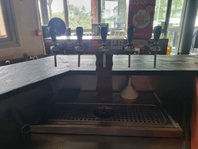 an image of a beer tap in a restaurant