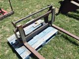 a wooden pallet that is sitting in the grass