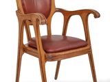 an image of a wooden chair with leather seat and armrest