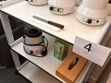 a small table with a bunch of appliances on it