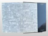 a book that has a picture of a city on it