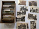 an old photo of a bunch of old photos in a box