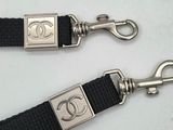 two black and silver lanyards on a white surface