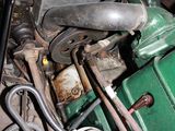 a close up of a green engine with a wren on it
