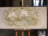 a picture of a painting on a easel in a room