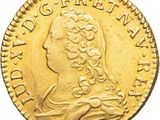 l'image d'une pièce d'or sur laquelle figure une tête de femme