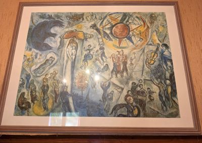 painting of a group of people in a room with a wooden wall