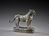 an image of a bronze statue of a lion on a marble base