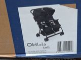 a box with a picture of a stroller in it