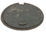 a small metal object with a hole in the middle of it