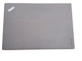 a laptop that is sitting on a white surface