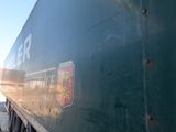 a semi truck that is parked in a garage