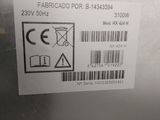 a label on the back of a machine that has a barcode on it