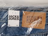 the back of a pair of jeans wrapped in plastic