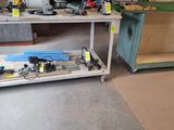 a workbench with tools on top of it in a garage