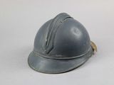 a helmet that is sitting on a white surface