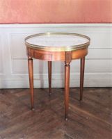 TABLE BOUILLOTTE de style Louis XVI en merisier mouluré et s…