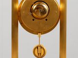 a clock that is sitting on top of a table