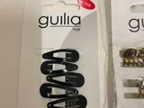 a bunch of hair clips that are in the package