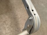 a close up of a metal frame on the floor