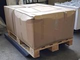 a large box on a pallet in a warehouse