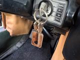 a close up of a car dashboard with a bunch of keys