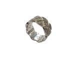 a close up of a silver ring on a white background