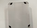 a white object on a white surface that looks like a square