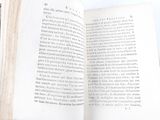 an open book with a picture of a cat on it