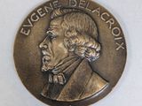 une image représentant une pièce de monnaie sur laquelle figure le portrait d'un homme