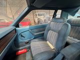 a picture of the interior of a car with the seat up