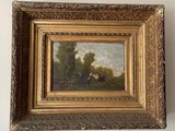 un vieux tableau accroché au mur d'une pièce