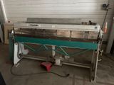 an image of a machine that is sitting in a garage