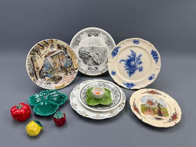 a lot of plates that are sitting on a table