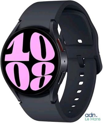 a black smart watch with a pink logo on it