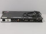 a close up of a video recorder with a cable on top of it