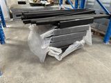a large pile of metal items in a warehouse
