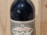 a bottle of wine that is sitting on a table