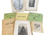 an old photo of a group of books with pictures on them