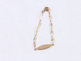 gold plated bracelet with a leaf charm on a white background