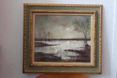 une image d'un tableau accroché au mur