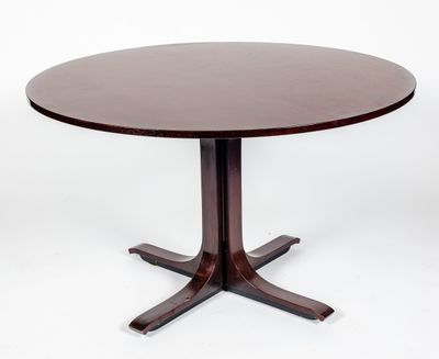 Table circulaire en placage de bois teinté reposant sur un p… - Photo 1