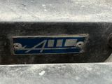 a close up of a metal box with a blue all logo on it