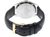 a close up of a watch on a white surface with a black strap