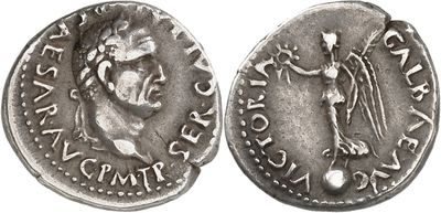 a silver coin with an image of a woman and a man on it