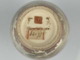 a close up view of a glass with a label on it