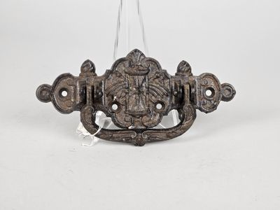 a close up of a metal door handle on a white background