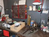 a workbench with a lot of tools on it