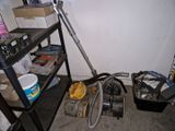 an image of a room with a vacuum and other items
